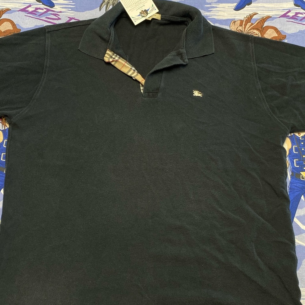 Used black Burberry polo shirt size L
